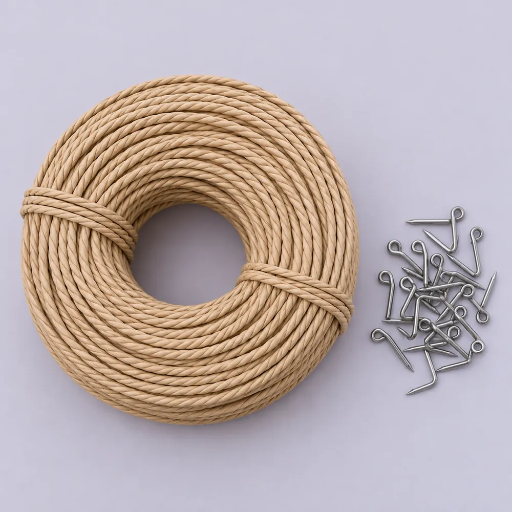 Flat lay of a large coil of light tan laced Danish cord and a small pile of steel L-nails on pale lavender paper