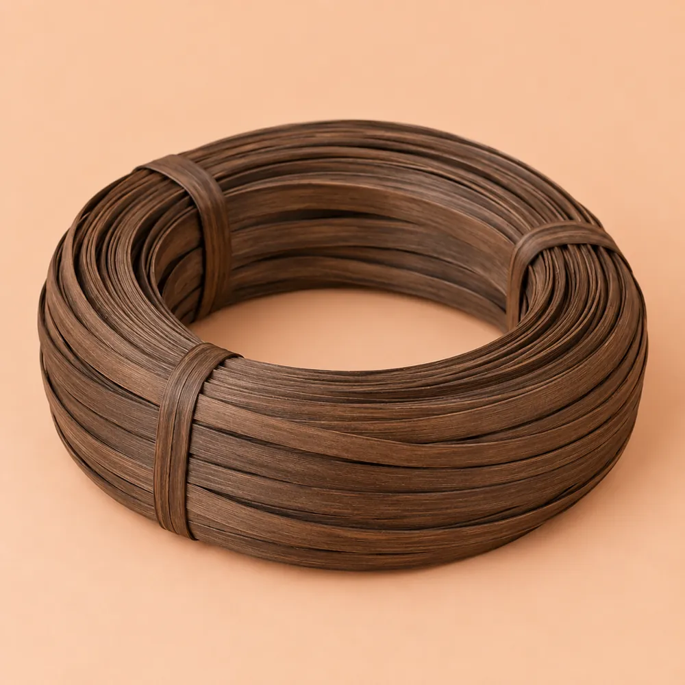 Coil of smoked flat reed in an even deep brown, strips about 1/2 in wide, tied, on a warm peach backdrop